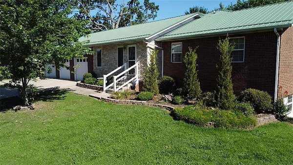 13.4 Acres of Land with Home for Sale in Harrison, Arkansas