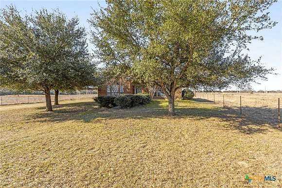 10 Acres of Residential Land with Home for Sale in Gause, Texas