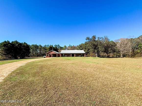 8.36 Acres of Residential Land with Home for Sale in Wiggins, Mississippi