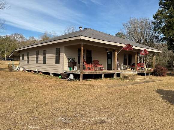 13.94 Acres of Land with Home for Sale in Honoraville, Alabama