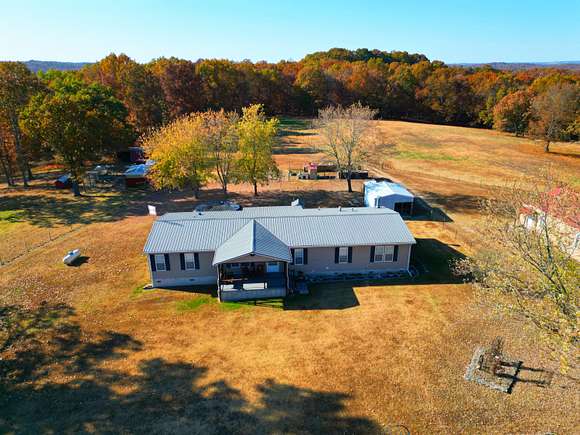 56 Acres of Land with Home for Sale in Ava, Missouri