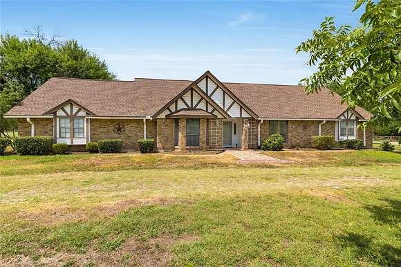 4 Acres of Residential Land with Home for Sale in Sachse, Texas