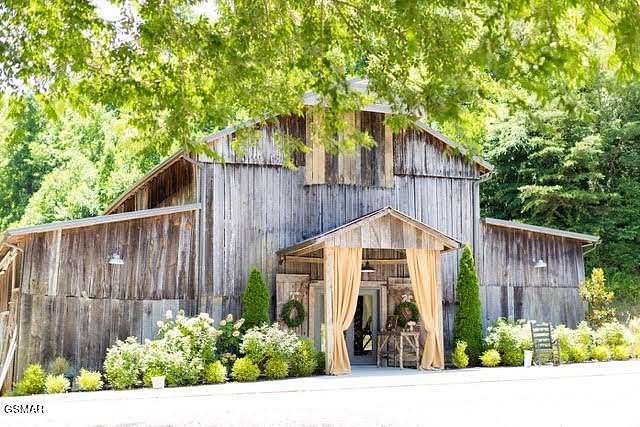 12.9 Acres of Improved Mixed-Use Land for Sale in Sevierville, Tennessee