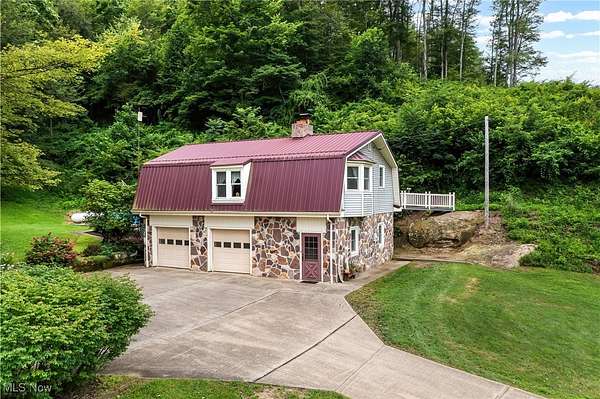 28.8 Acres of Land with Home for Sale in New Concord, Ohio