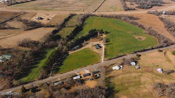 37.6 Acres of Land with Home for Auction in Dyer, Tennessee