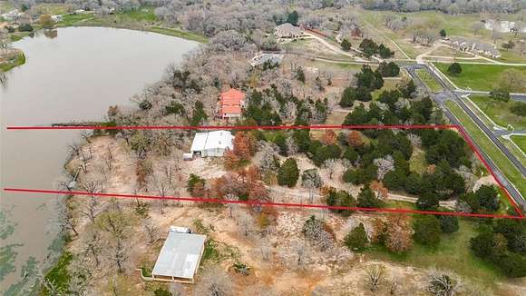 4.44 Acres of Residential Land with Home for Sale in Terrell, Texas
