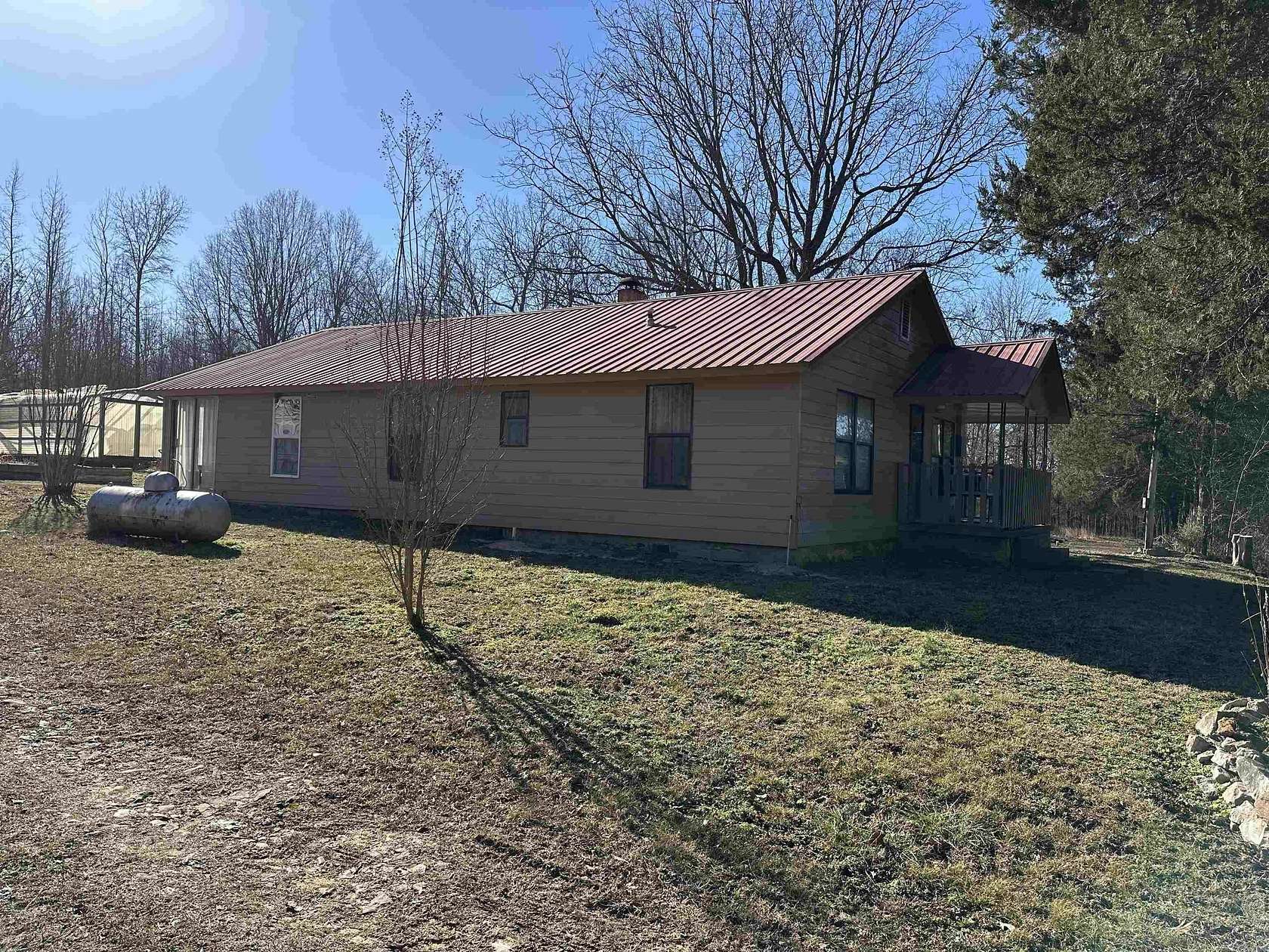 40 Acres of Land with Home for Sale in Maynard, Arkansas