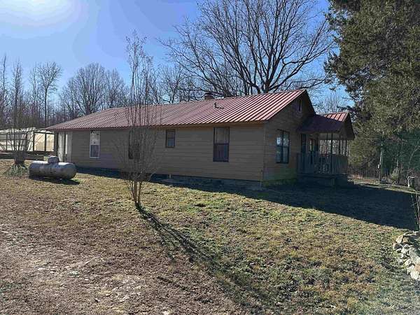 40 Acres of Land with Home for Sale in Maynard, Arkansas
