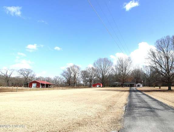 5.35 Acres of Land with Home for Sale in Milan, Tennessee