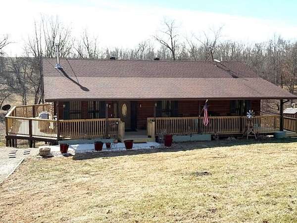 9.3 Acres of Land with Home for Sale in Mountain Grove, Missouri