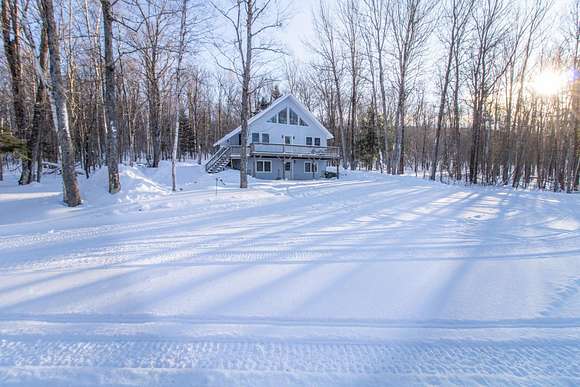 26.2 Acres of Recreational Land with Home for Sale in Brighton Town, Vermont