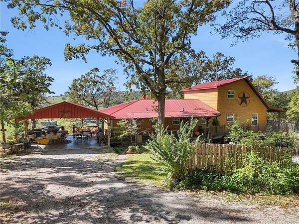 3.67 Acres of Residential Land with Home for Sale in Berryville, Arkansas