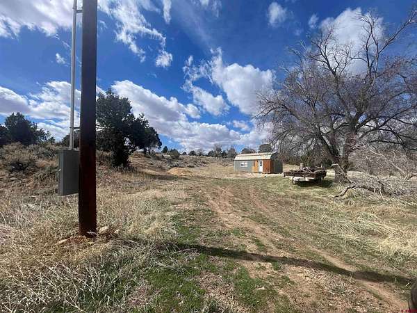 0.82 Acres of Residential Land with Home for Sale in Dove Creek, Colorado