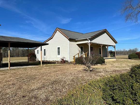 85 Acres of Land with Home for Sale in Crandall, Georgia