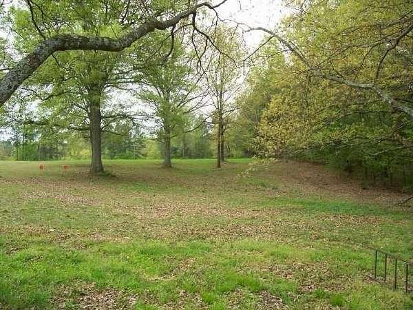 10.7 Acres of Land with Home for Sale in Eads, Tennessee