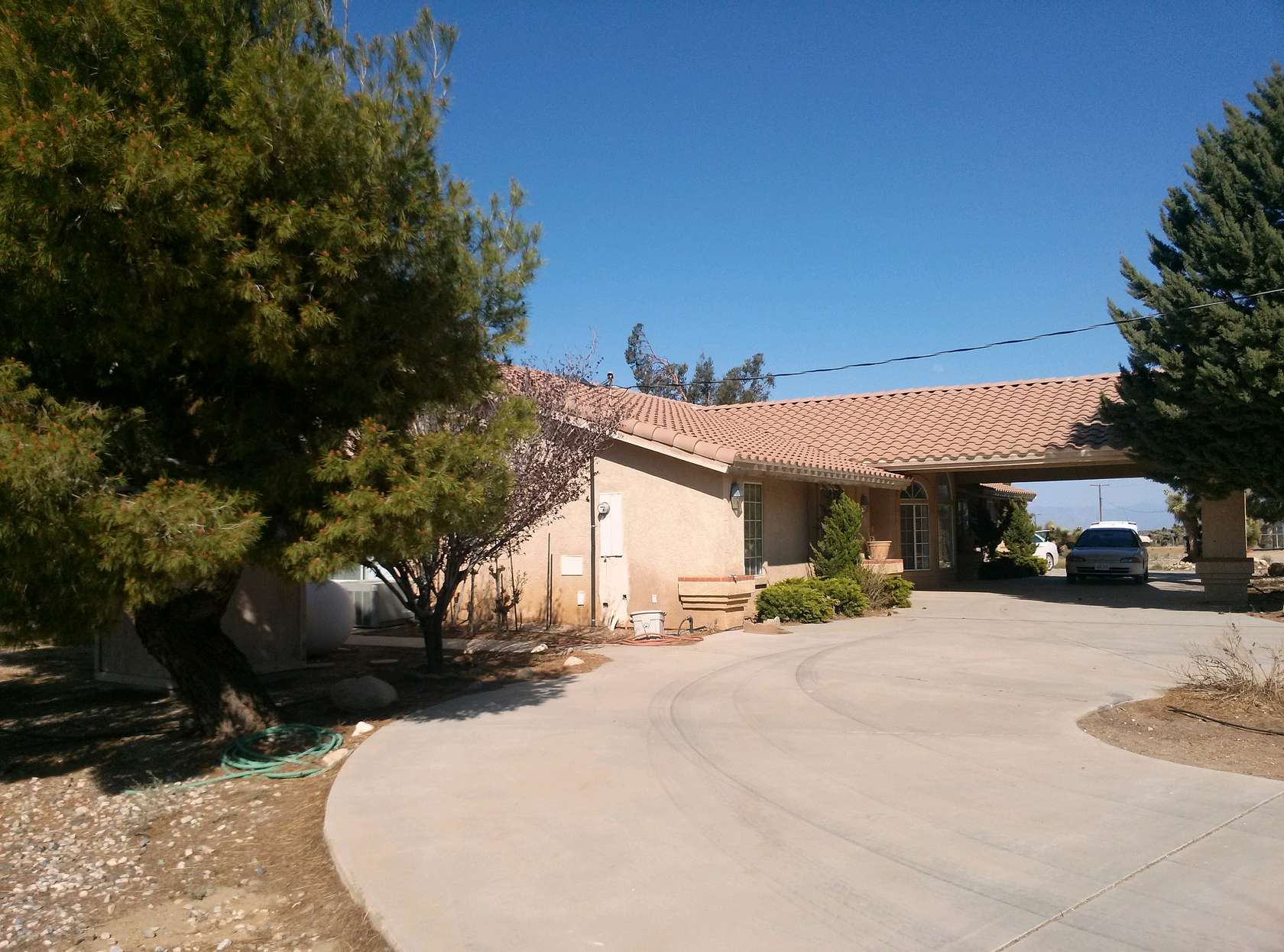 7 Acres of Residential Land with Home for Lease in Phelan, California