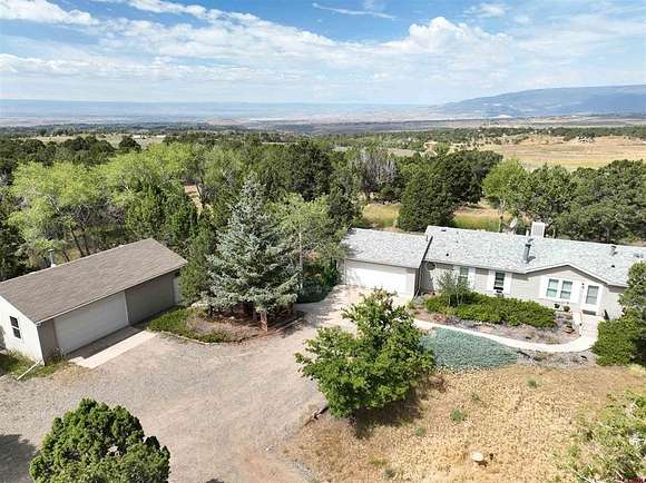 20 Acres of Recreational Land with Home for Sale in Hotchkiss, Colorado