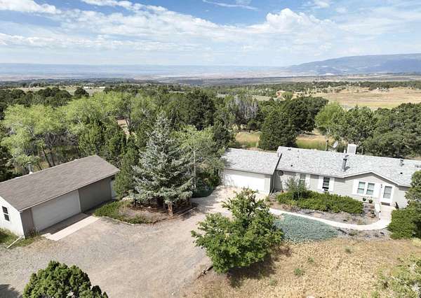 20 Acres of Recreational Land with Home for Sale in Hotchkiss, Colorado