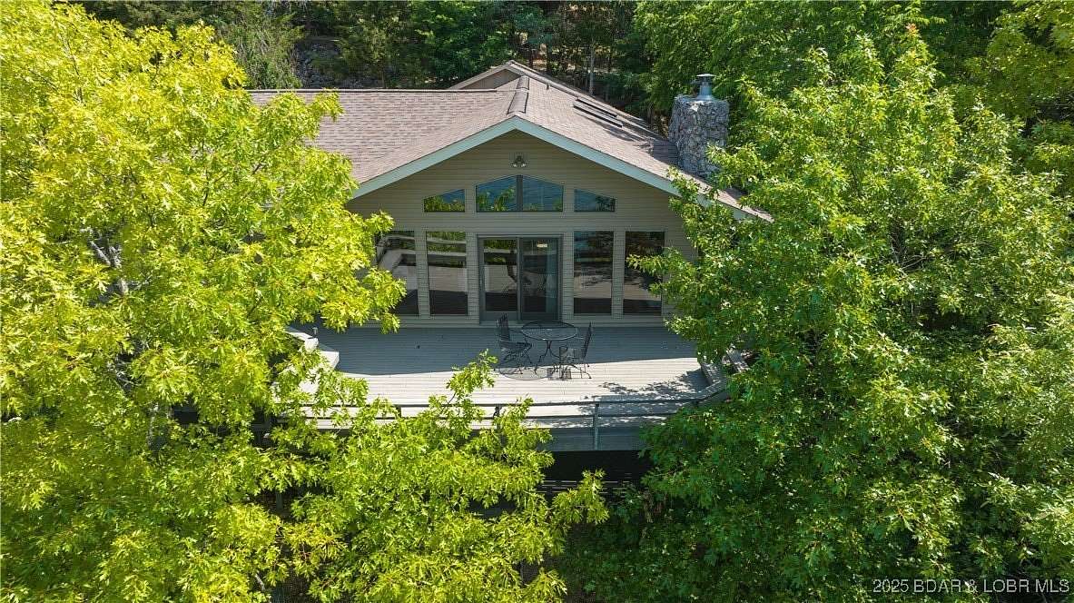 15.7 Acres of Land with Home for Sale in Sunrise Beach, Missouri