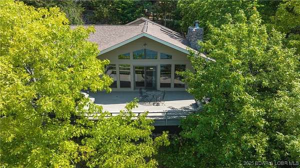 15.7 Acres of Land with Home for Sale in Sunrise Beach, Missouri