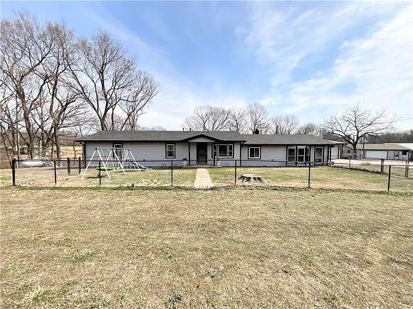 5 Acres of Residential Land with Home for Sale in Kansas, Oklahoma