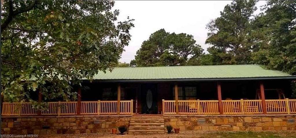 15 Acres of Land with Home for Sale in Clarksville, Arkansas