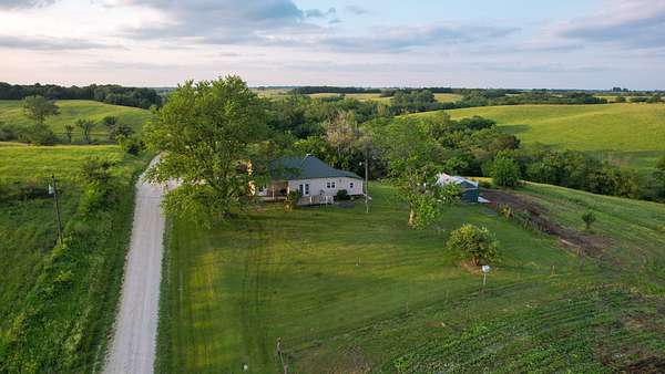 490 Acres of Land with Home for Sale in Green City, Missouri