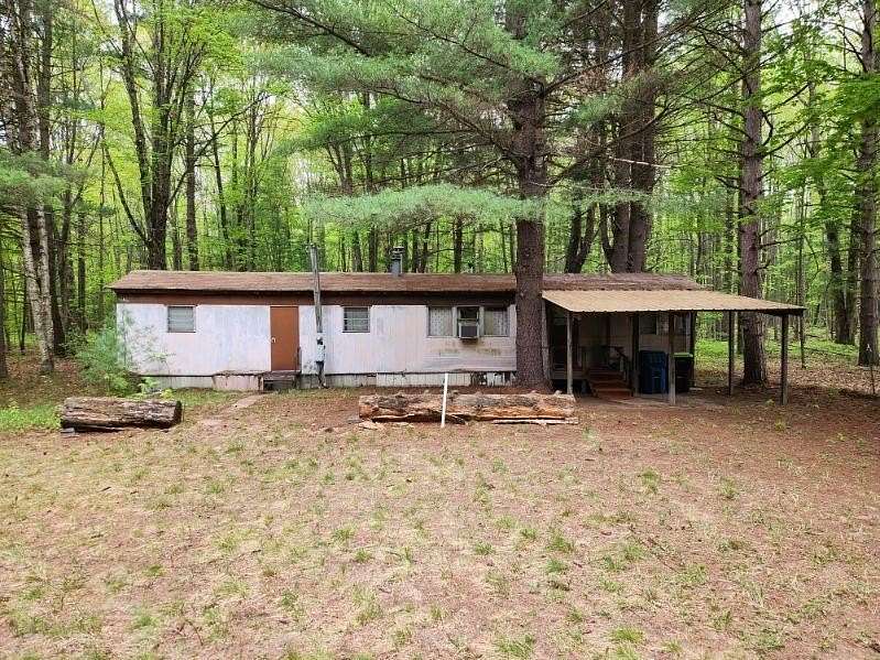 5 Acres of Residential Land with Home for Sale in Beaverton, Michigan