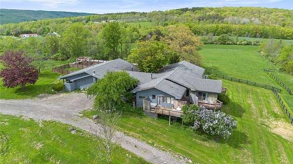 30.6 Acres of Land with Home for Sale in Naples, New York