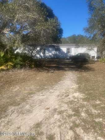 1.25 Acres of Residential Land with Home for Sale in Bronson, Florida