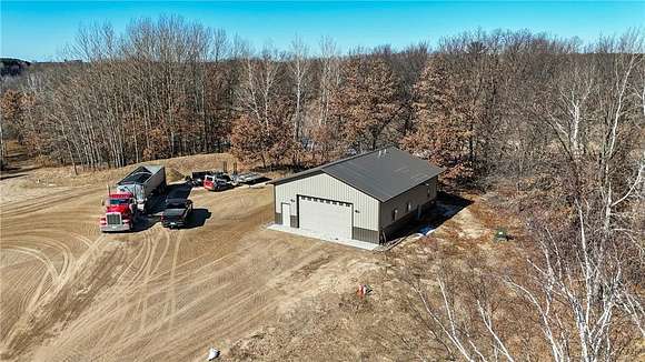 57 Acres of Recreational Land with Home for Sale in Cambridge, Minnesota