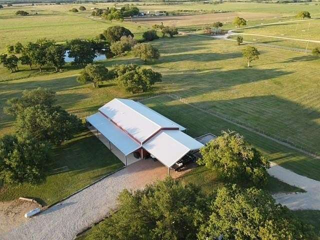 25.8 Acres of Agricultural Land with Home for Sale in May, Texas