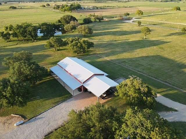 25.8 Acres of Agricultural Land with Home for Sale in May, Texas
