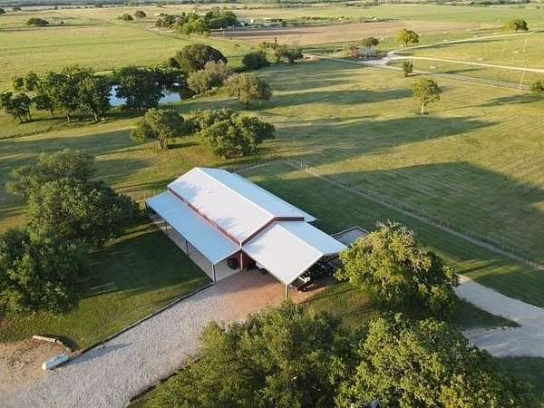 25.8 Acres of Agricultural Land with Home for Sale in May, Texas