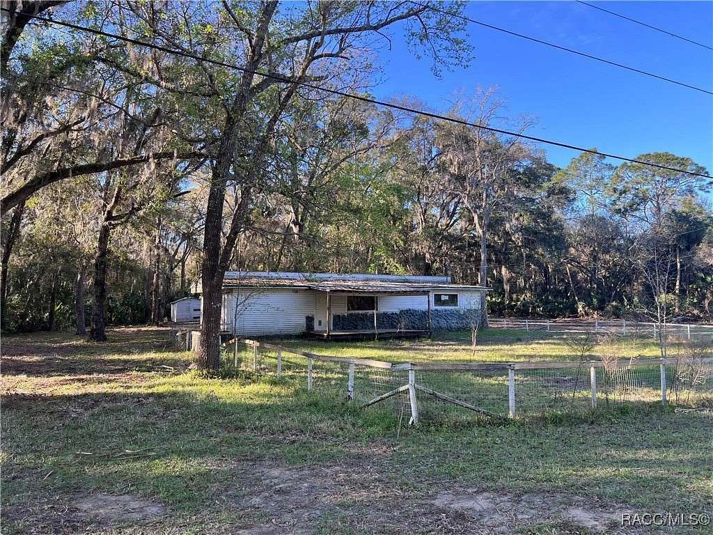 2 Acres of Residential Land with Home for Sale in Inglis, Florida