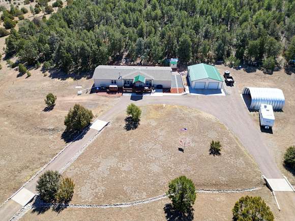 10 Acres of Land with Home for Sale in Edgewood, New Mexico