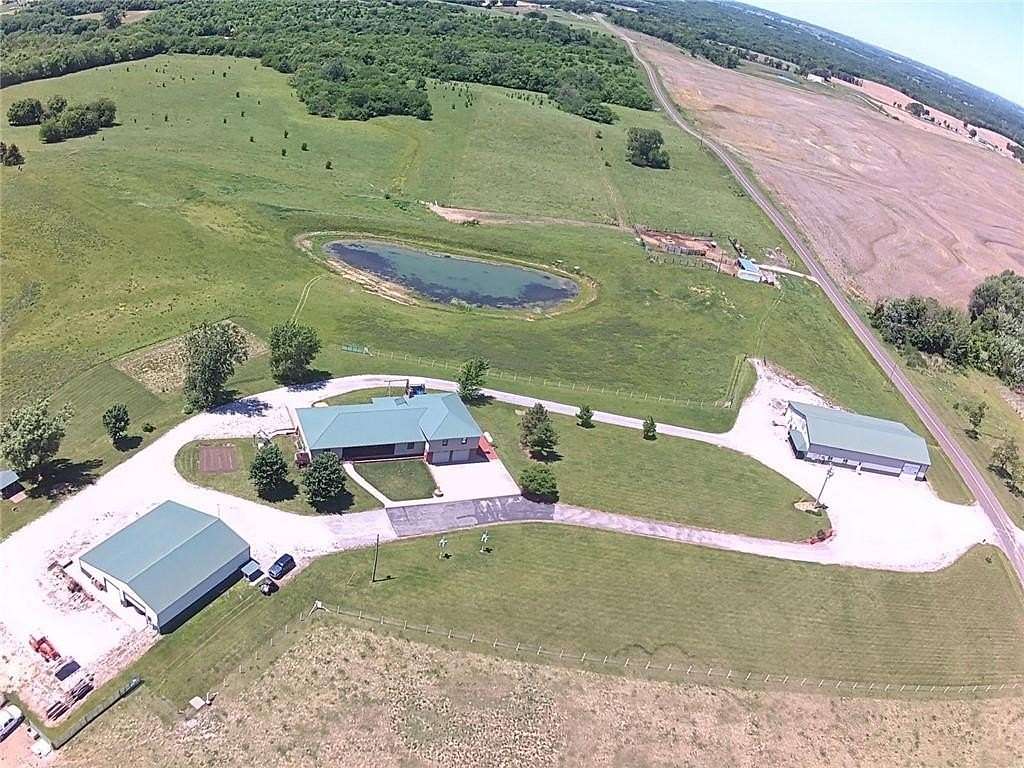 77.9 Acres of Land with Home for Sale in Weatherby, Missouri