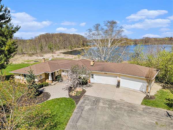 2 Acres of Residential Land with Home for Sale in Sand Lake, Michigan