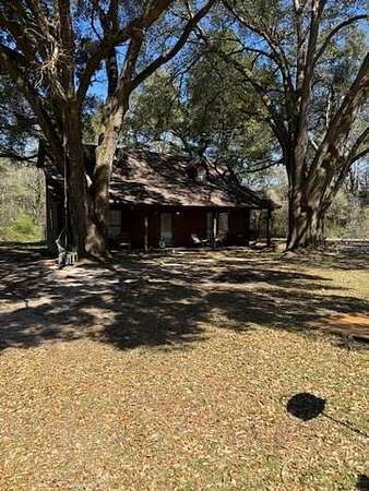 8 Acres of Residential Land with Home for Sale in St. Stephens, Alabama
