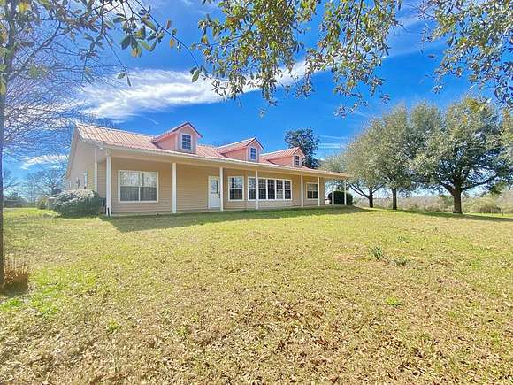 7.36 Acres of Residential Land with Home for Sale in San Augustine, Texas