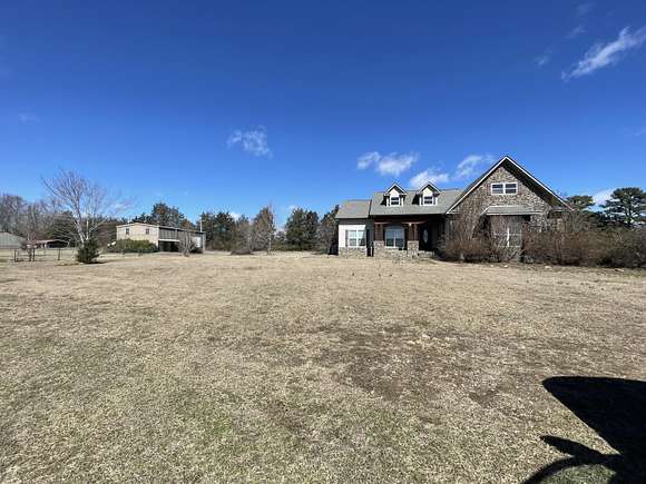 7.4 Acres of Residential Land with Home for Sale in Clarksville, Arkansas