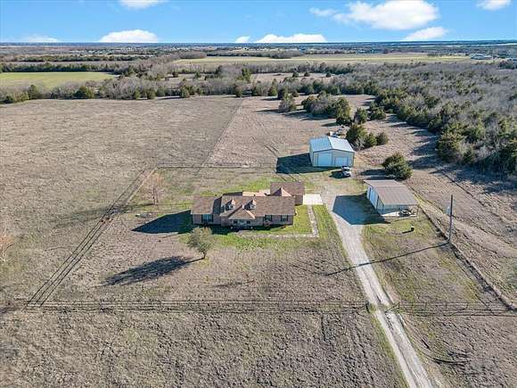 32.3 Acres of Agricultural Land with Home for Sale in Farmersville, Texas