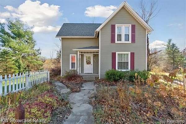 2 Acres of Land with Home for Sale in Highland Township, Michigan