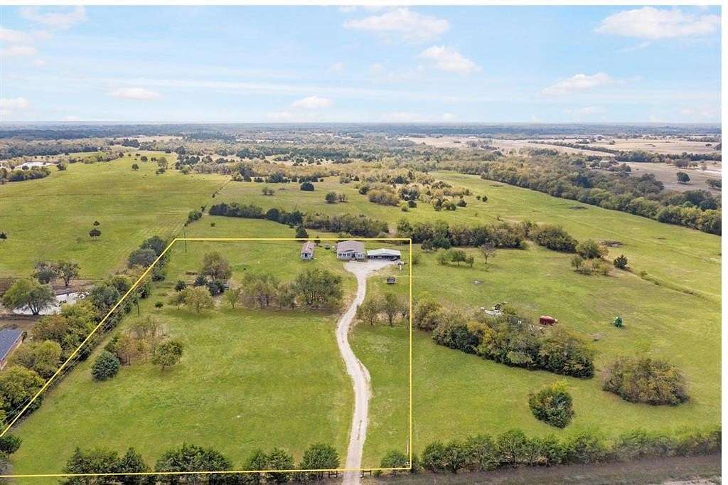 82.3 Acres of Agricultural Land with Home for Sale in Campbell, Texas