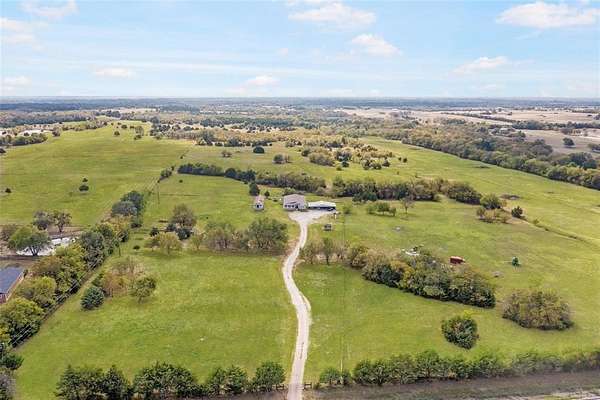 82.3 Acres of Agricultural Land with Home for Sale in Campbell, Texas