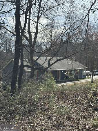 12.1 Acres of Land with Home for Sale in Flowery Branch, Georgia