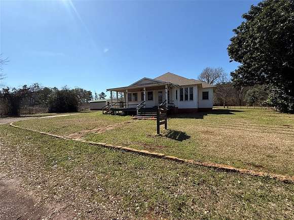 16.8 Acres of Land with Home for Sale in Alto, Texas