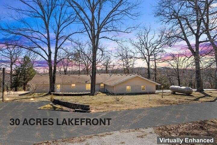 29.7 Acres of Land with Home for Sale in Cape Fair, Missouri