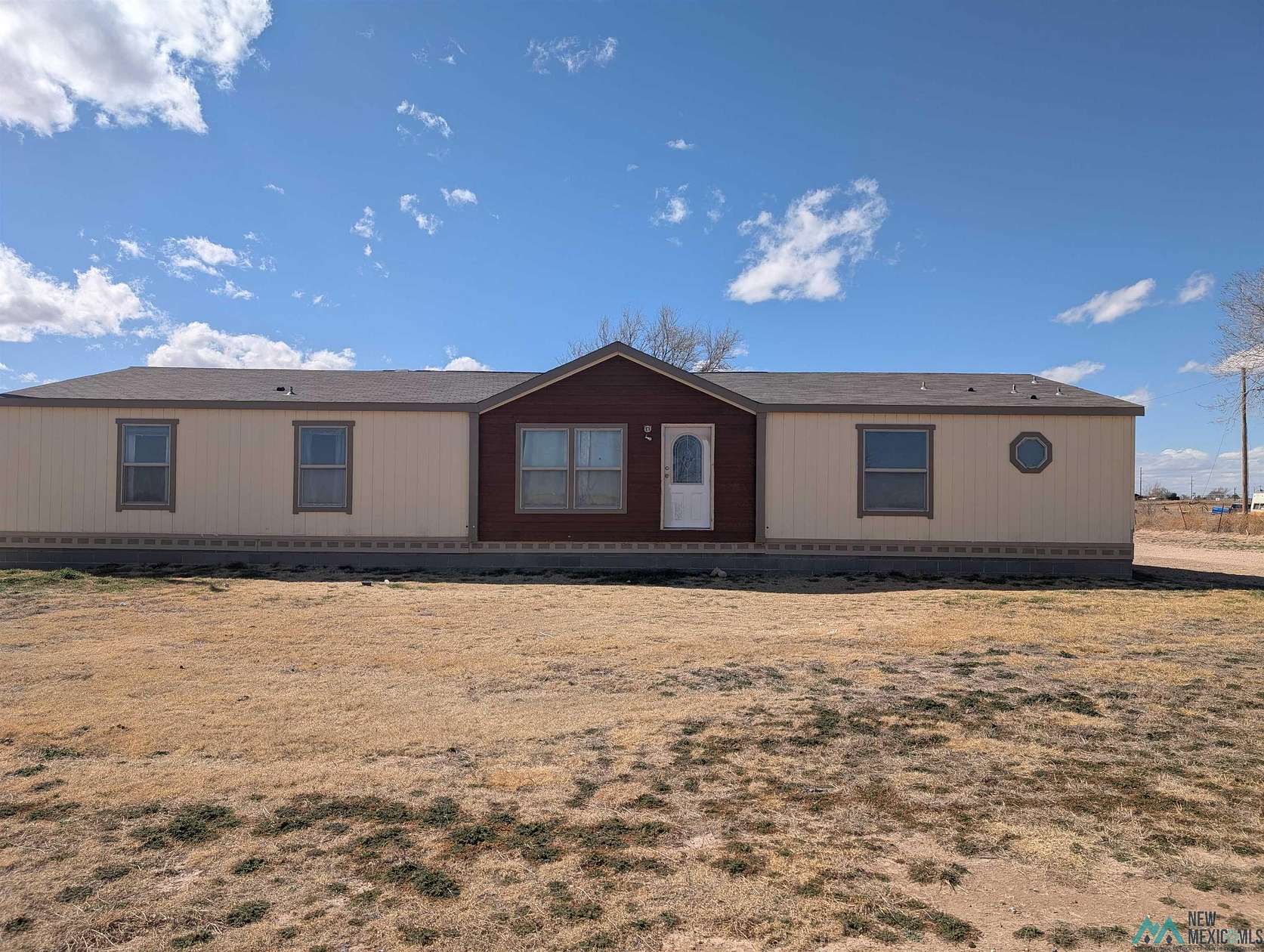 1.5 Acres of Residential Land with Home for Sale in Portales, New Mexico