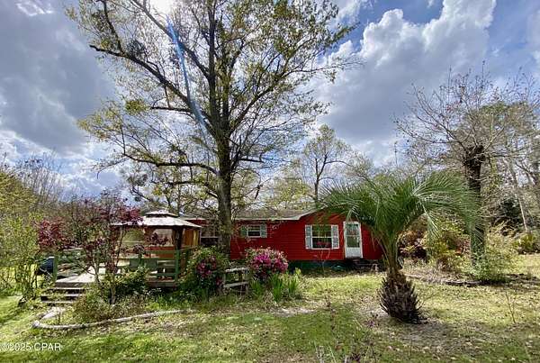 36.6 Acres of Land with Home for Sale in Marianna, Florida